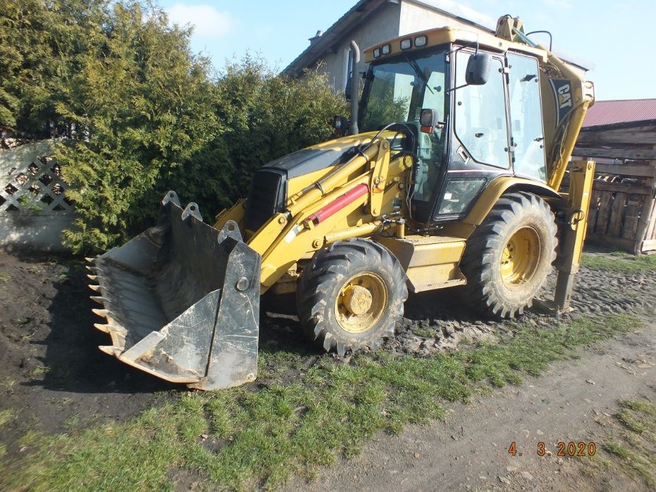 Usługi koparko-ładowarką , montaż szamb i oczyszczalni eko dom