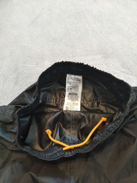 Spodnie przeciwdeszczowe Quechua roz. XS W28 L33