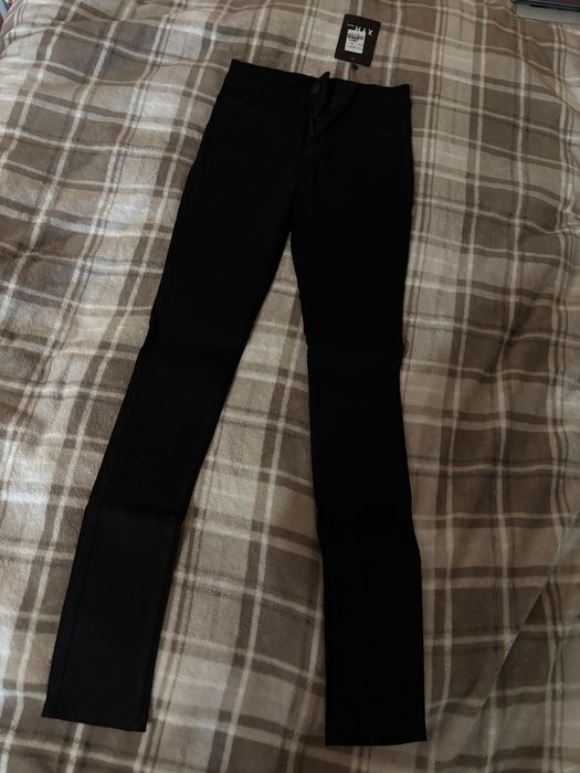 Нові жіночі чорні теплі штани на флісі