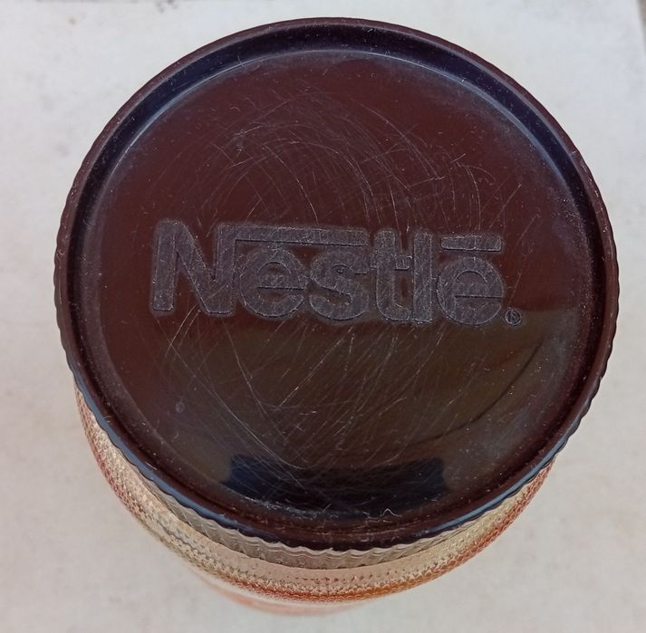 Frasco antigo de vidro da Nestlé
