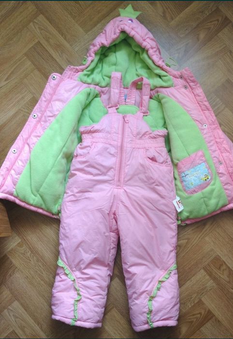 Продам красивый зимний комбинезон для девочки Donilo