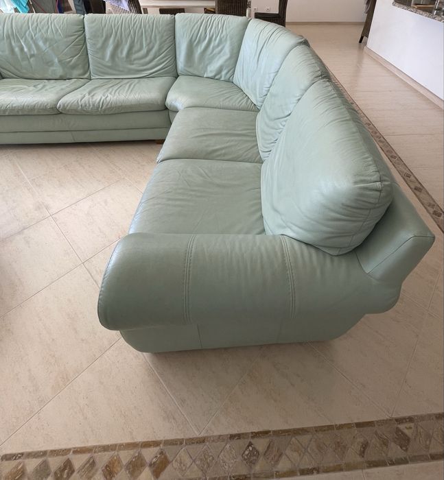 Sofá de canto em pele verde água