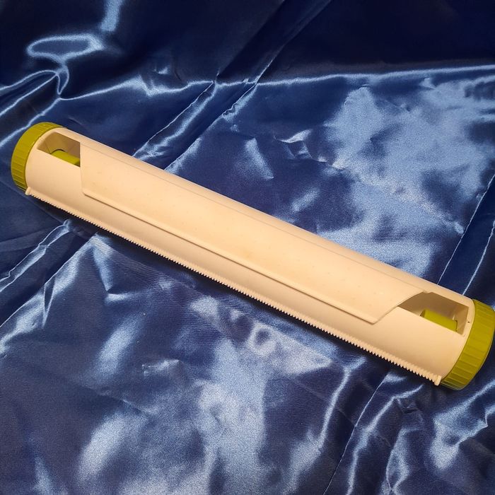 Dispensador para papel de alumínio ou película aderente