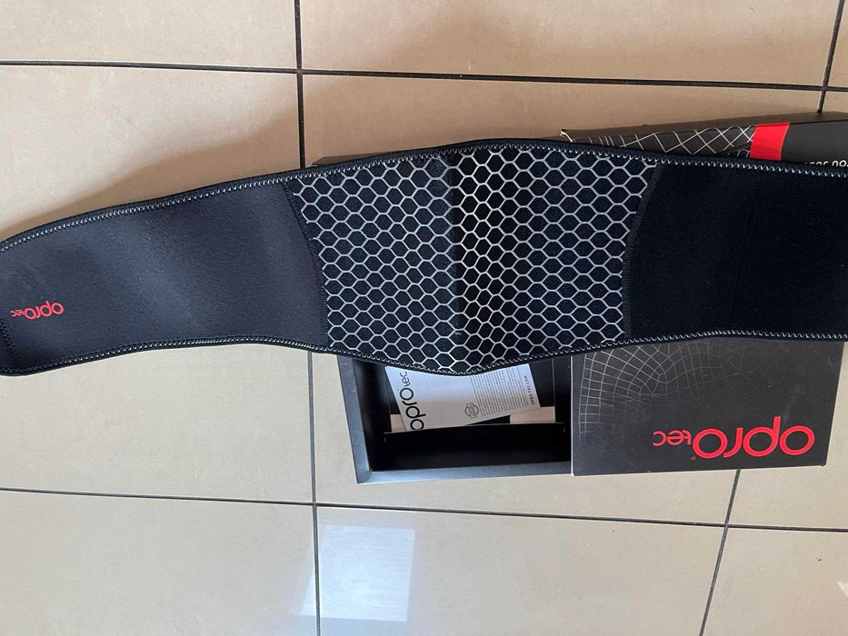 Ściągacz ochraniacz na łokieć orteza OPROtec 5753