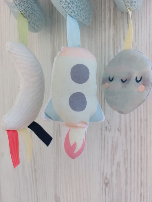 Іграшка на автокрісло коляску