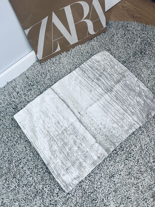 Kremowa bezowa poszewka na poduszke jaska we wzory boho
