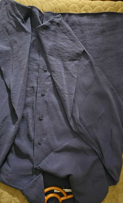 Camisa com gola larga