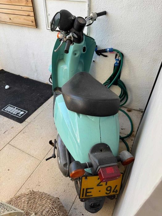 Mota Honda em excelente estado