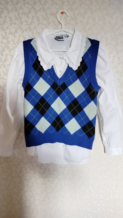 Вінтажна жилетка в клітинку