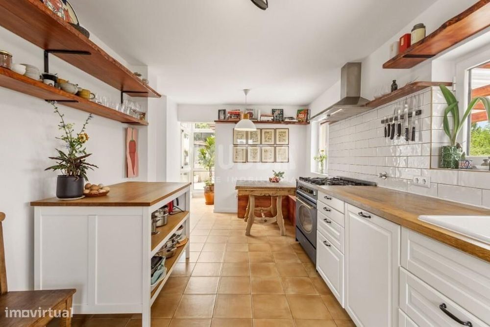 Moradia térrea T3 com anexos e terreno no Campo/Caldas da Rainha