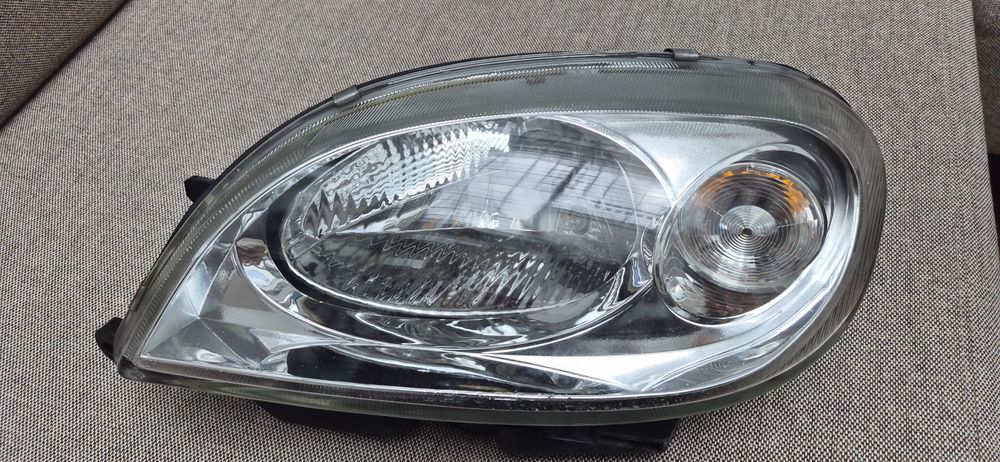 reflektor lewy  Citroën Saxo po lift