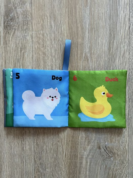 Книжка шуршалка  тваринки нова