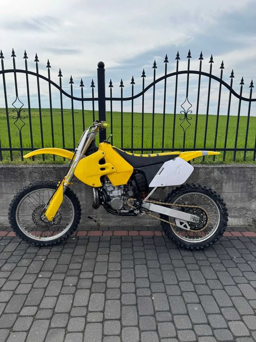 Czesci Suzuki rm 250 rok 96-00 kopka dyfuzor wał kartery glowica kola