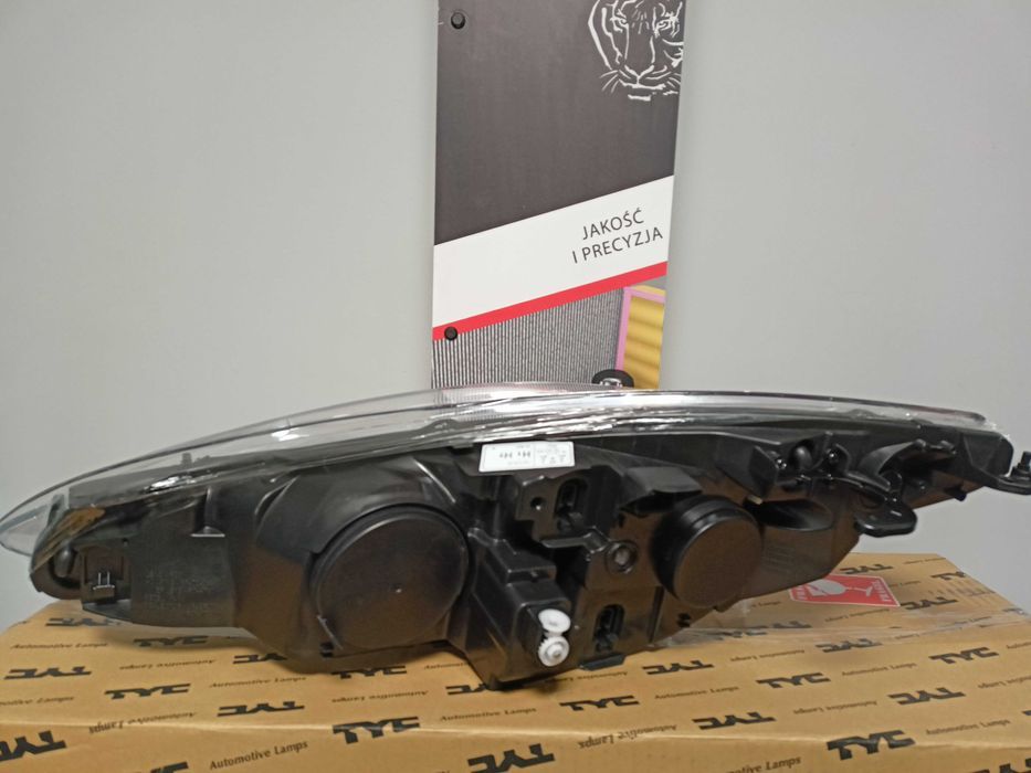 Peugeot 308  07-11 Lampa/Reflektor przód prawy /H1+H7