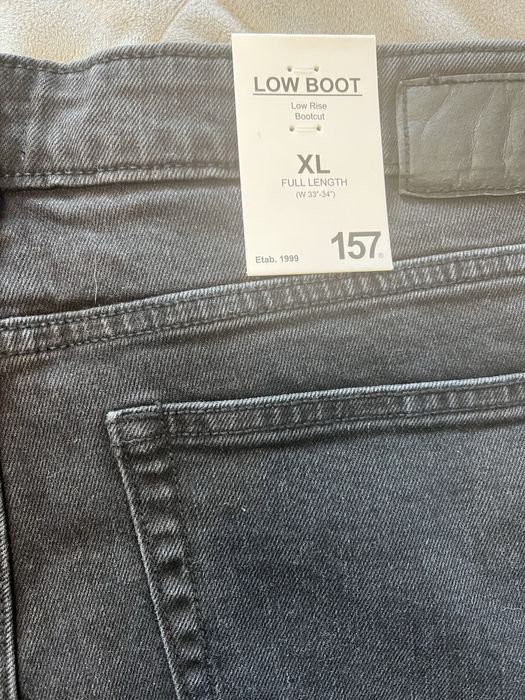 Темно сірі кльошові джинси р XL