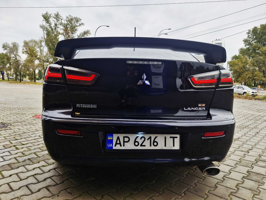 Митсубиши Лансер Х