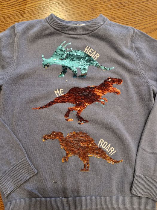 H&M 122/128 sweterek, cekiny dinozaury