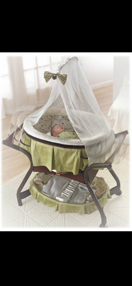 Fisher price zen hot sale collection gliding bassinet