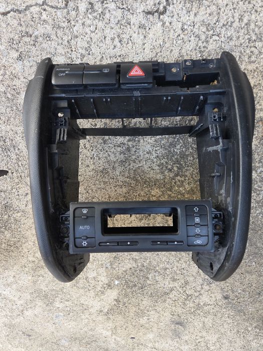 Consola seat leon 1m 2din adaptada.