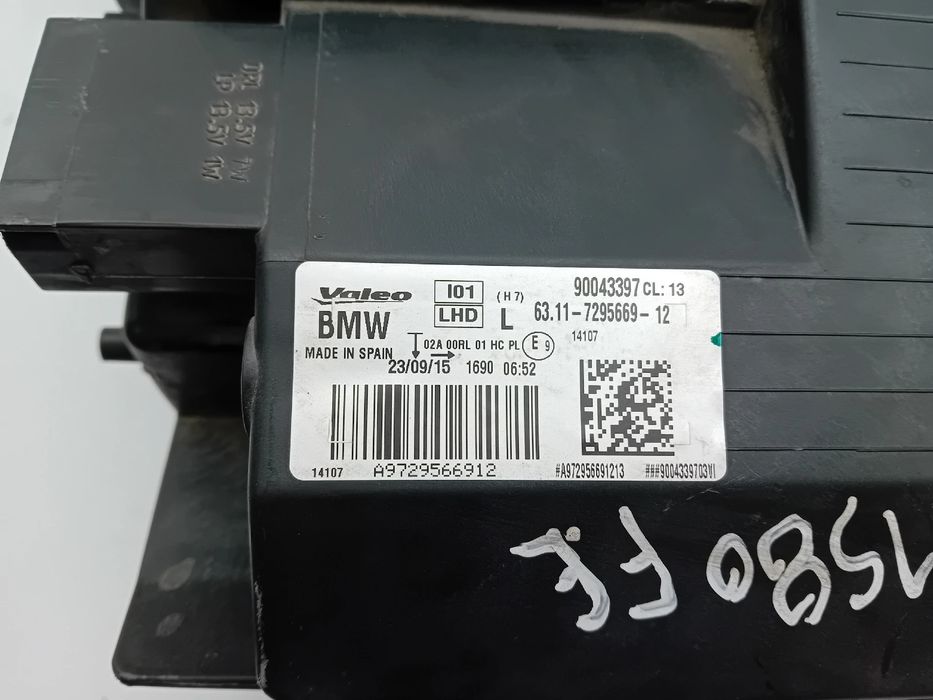 Ótica / farol esquerda BMW i3 (I01)