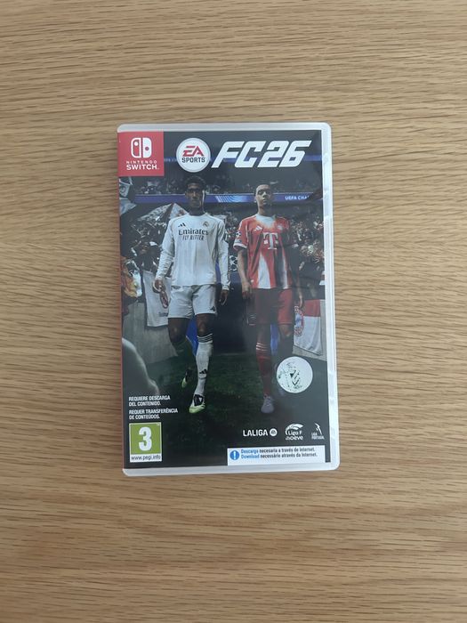 Pack Nintendo Switch (Como Nova) + Jogo EA Sports FC 26 + 2 Bolsas + Acessórios