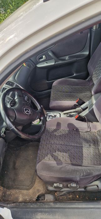Мазда 323 Protege5 GXI