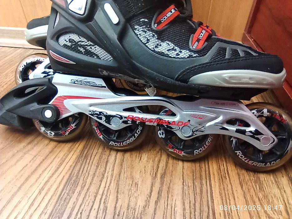 Ролики підліткові, чоловічі Rollerblade (р. 41\26,5 см) стан нових.