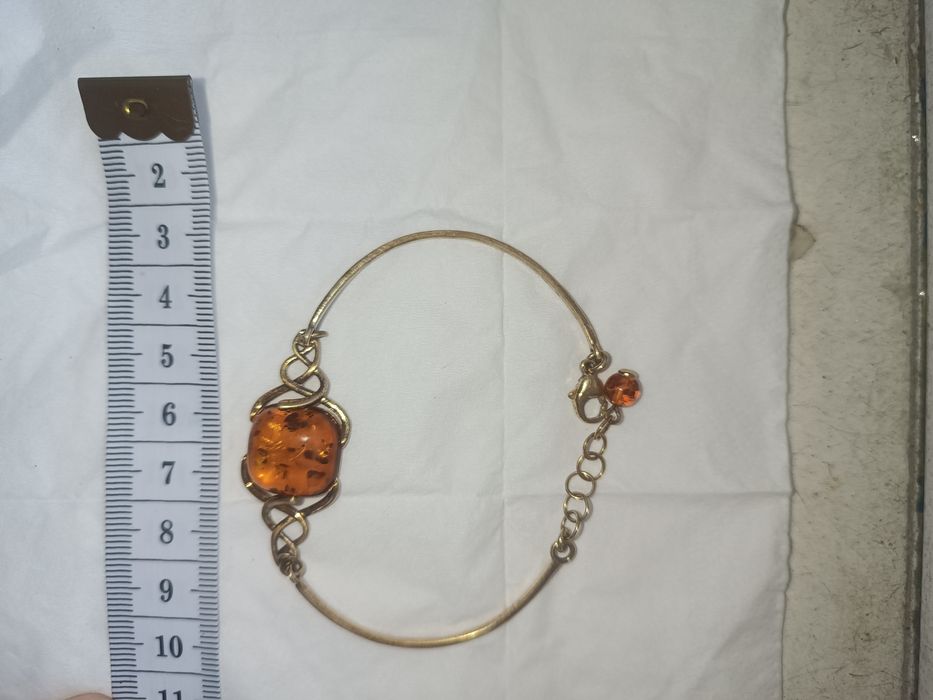 Браслет срібний в жовтій позолоті з бурштином