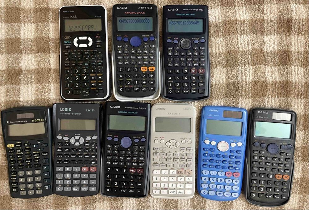 Лот калькуляторов 9шт. Casio,Sharp