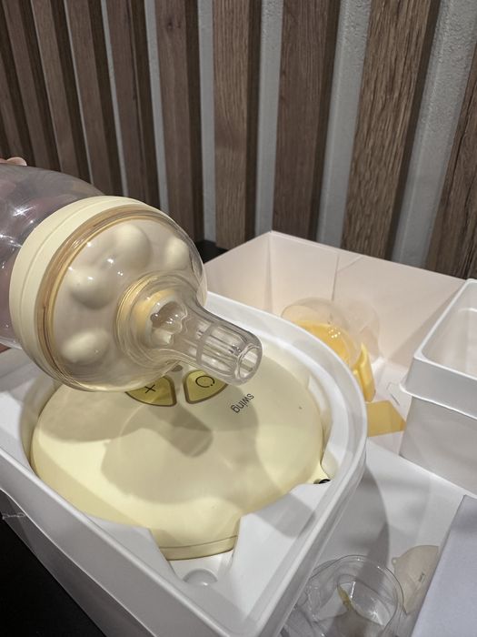 Молоковідсмоктувач Medela swing + calma