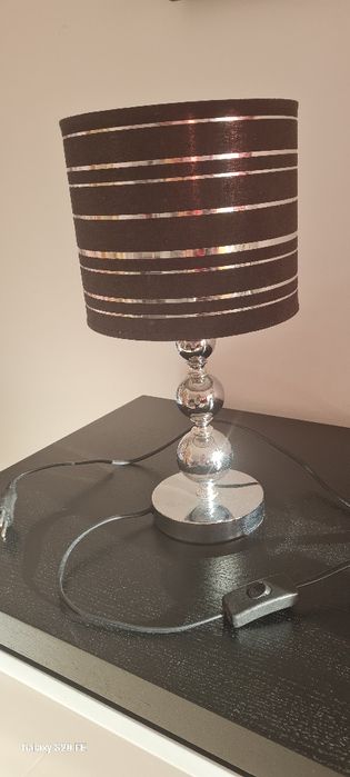 Candeeiro preto e prateado