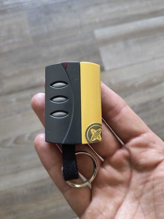 Emissor / Comando Garagem - Pujol (preto e amarelo)