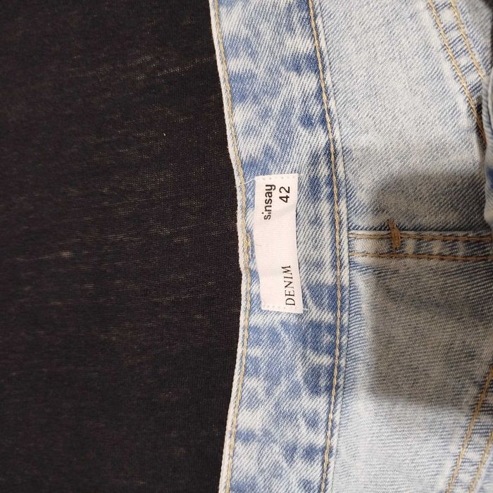 Джинси жіночі широкі