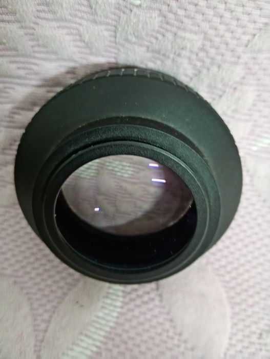 Teleconversor usado em câmera de Video