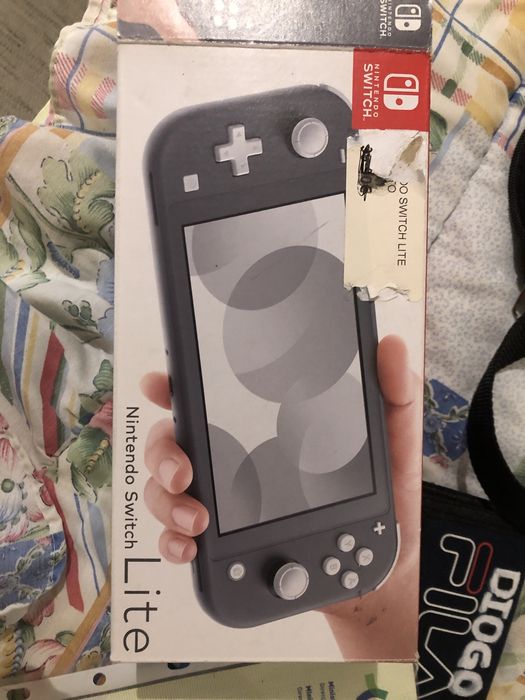 Nintendo switch lite c caixa+bolsa+ crash