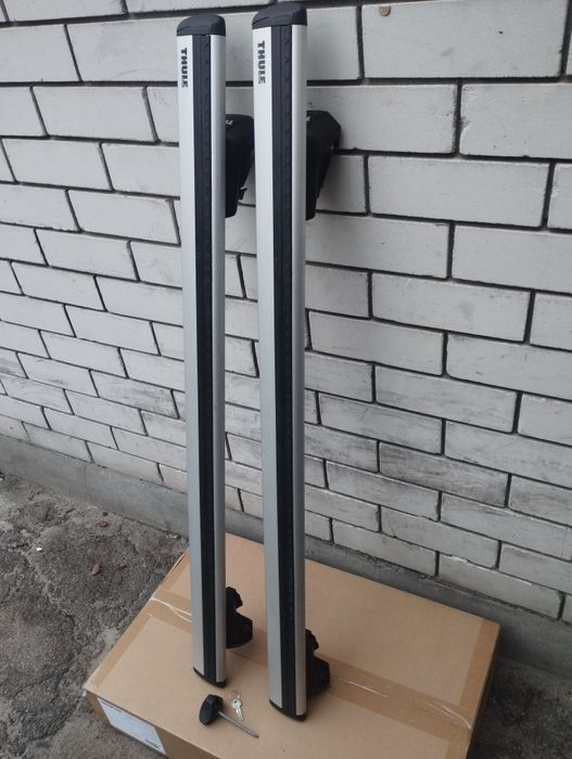 Багажник Thule 7104 Raised Rail WingBar Evo на рейлинги.