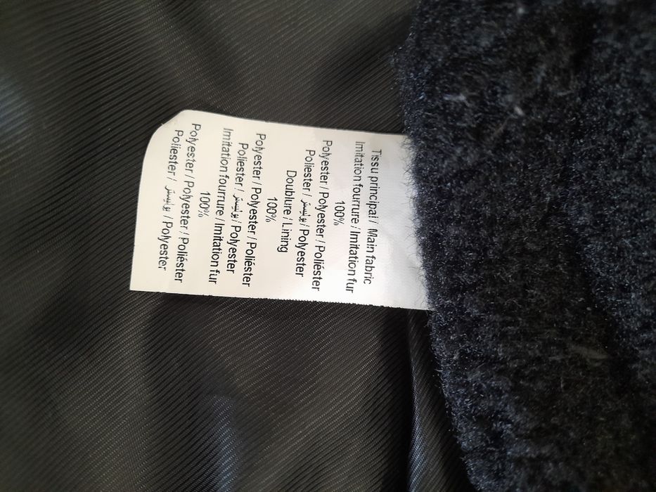 Casaco comprido de pelo encaracolado moderno