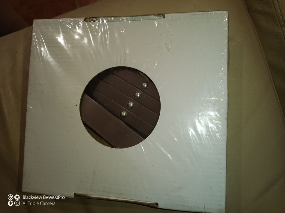 Espelho bastante interessante com suporte articulado