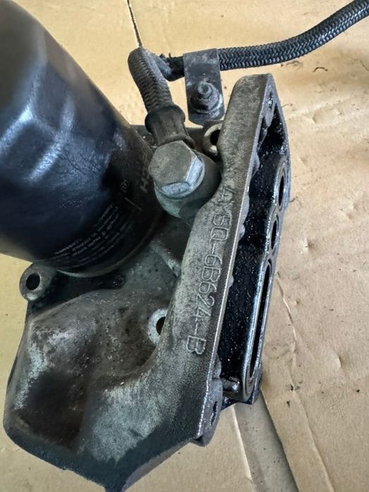 Корпус масляного фільтра Ford Connect 1.8 TDCi