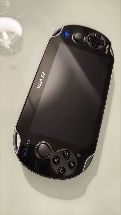 PS vita oled com jogos instalados muito bom estado