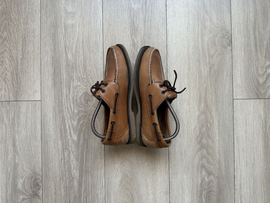 Шкіряні топсайдери Lacoste