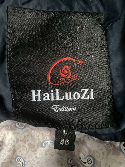 Тепла куртка пуховик