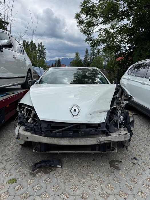 Renault Laguna Sprzedam Renault Laguna Coupé III – uszkodzona Na sprzedaż Renault La