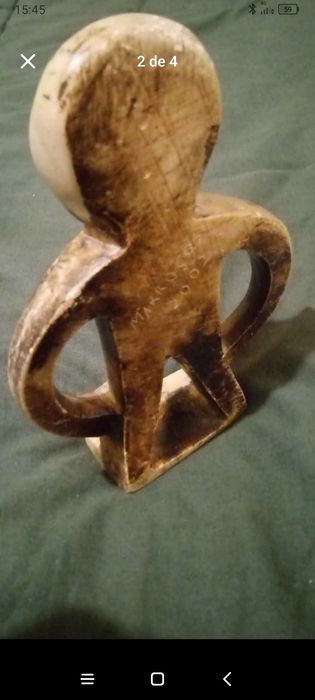 Boneco de pedra para enfeitar