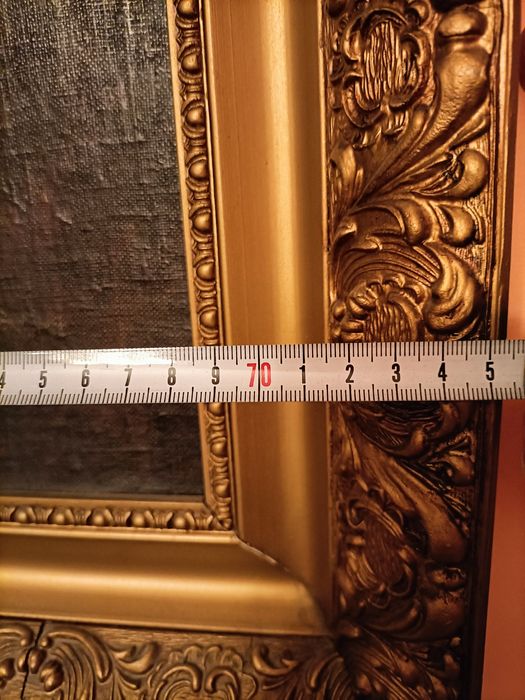 Stary, duży obraz w ramie