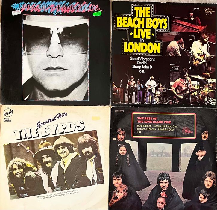 Платівки Elvis Presley Chuck Berry The Beatles Buddy Holly Bob Dylan The Beach Boys, etc