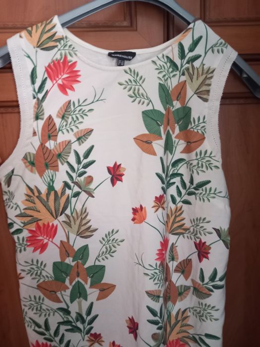 Biała bluzka warehause 12 z motywem roslinnym