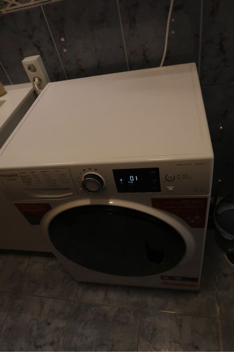 Máquina de lavar e secar roupa
