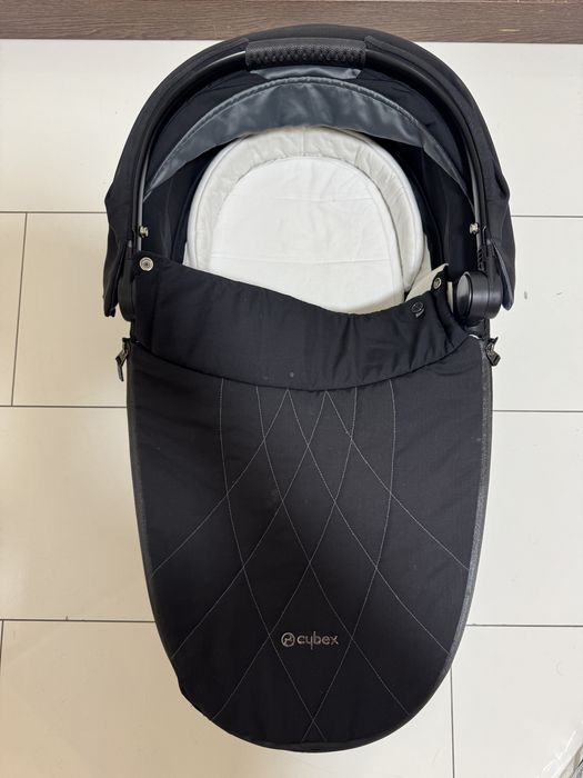 Cybex Mios Platinum Люлька з дощовиком чорна кроватка