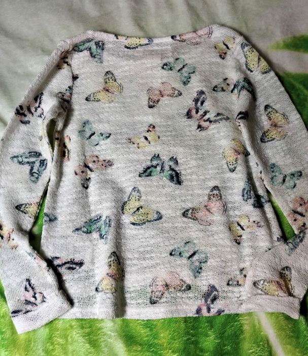 Sweterek w motyle H M rozmiar 122/128